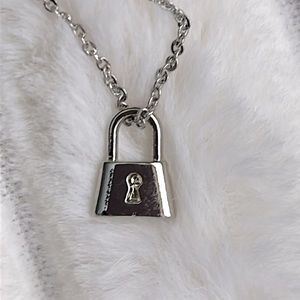 DAINTY LOCK NECKLACE. Adjustable 16 inch. Lightweight.
